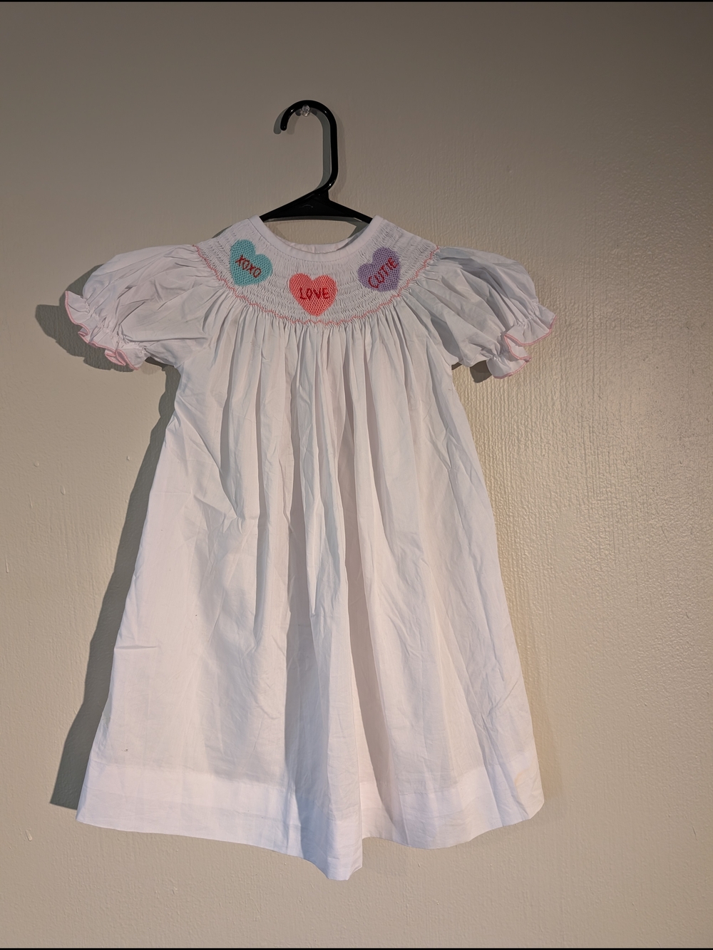 White Smocked Girls' Dress with Heart Motif